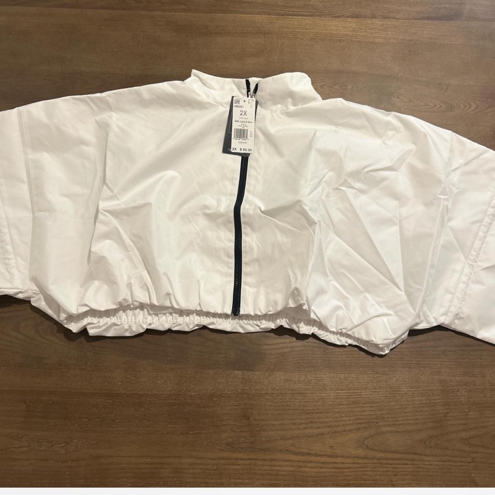 White windbreaker with black accents #sportswear